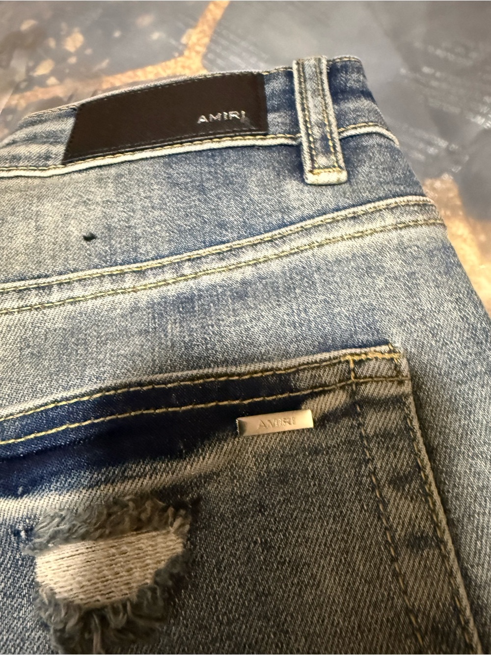 AMIRI Light Blue Distressed Jeans with Red Patch Details - Picture 3 of 4